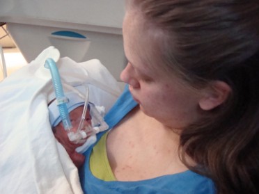 20091105b Burnham Campbell Trip Newborn Lily Renee First Time Holding Lily Michigan