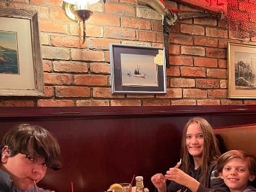 20241026a Bourland Burnham Campbell Birthday Dinner Lily 15th Michigan
